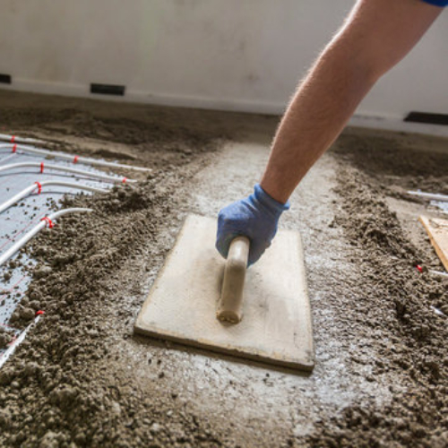 D&D Tiling and Renovations team performing floor screeding