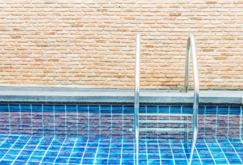 Waterline pool tiling adding style and durability