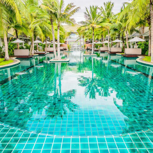 Expert pool tilers upgrading an outdoor swimming pool